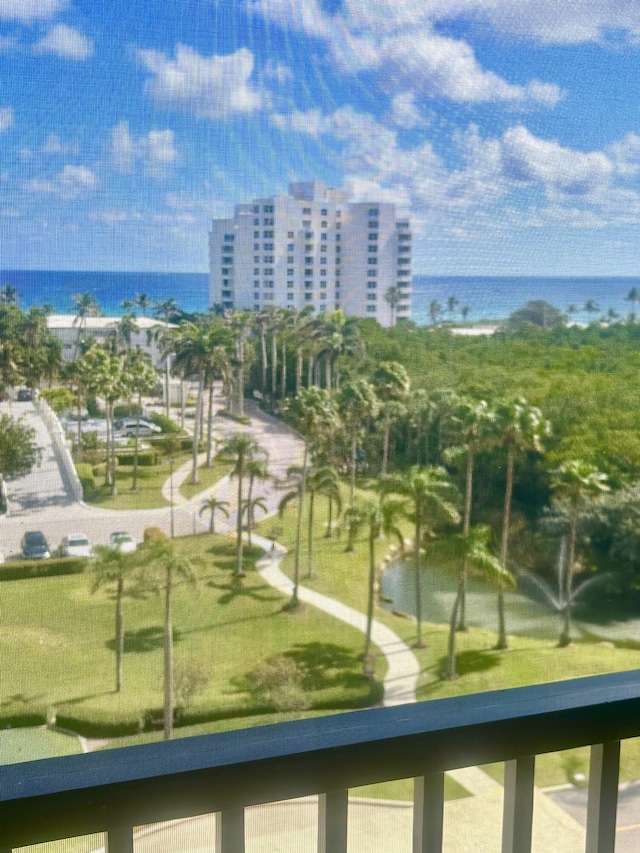 view of community with a water view