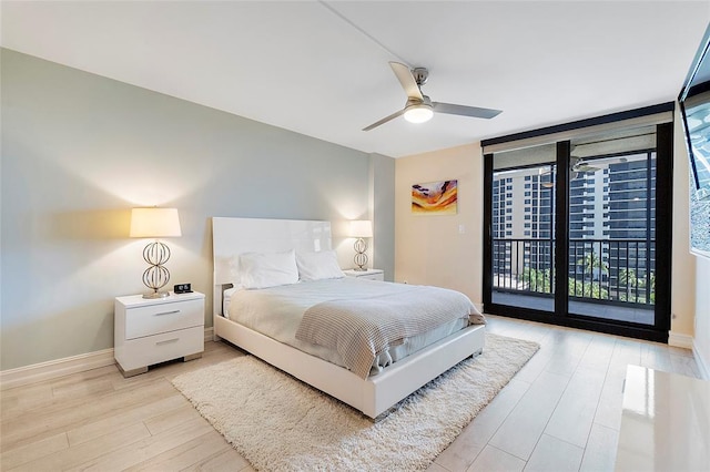 3420 S Ocean Blvd Unit 8Q, Highland Beach, FL 33487 - bedroom with light wood finished floors, access to outside, a wall of windows, and ceiling fan