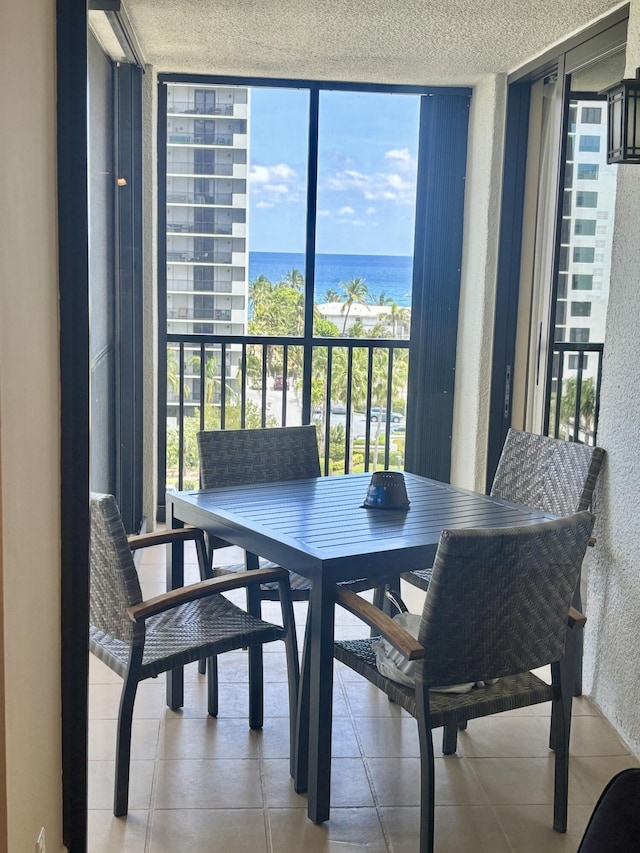 3420 S Ocean Blvd Unit 8Q, Highland Beach, FL 33487 - balcony with a water view and outdoor dining space