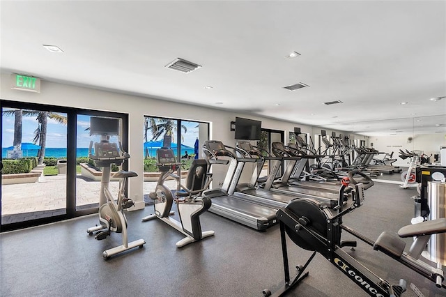 exercise room featuring visible vents