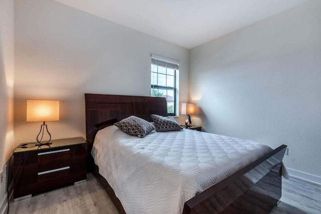 bedroom featuring light wood-type flooring