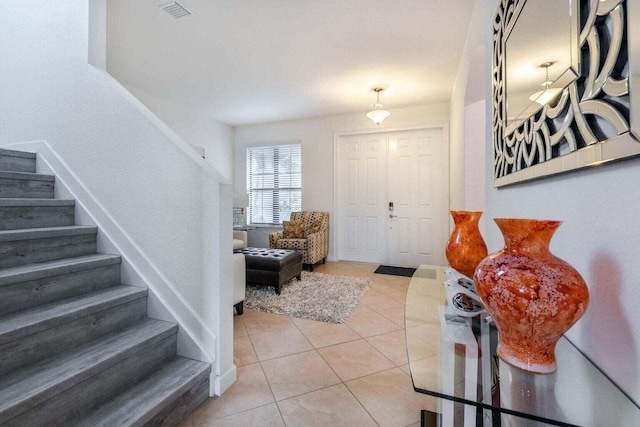 view of tiled foyer entrance