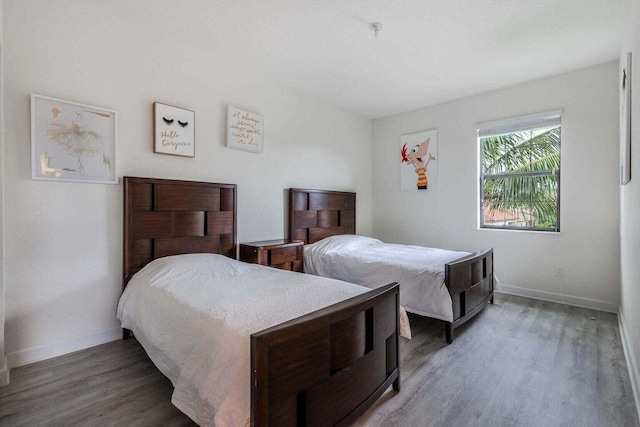 bedroom featuring hardwood / wood-style flooring