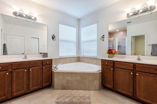 bathroom featuring vanity, tile patterned floors, and independent shower and bath