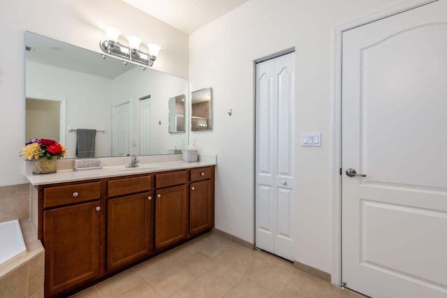 bathroom featuring vanity and tile patterned flooring