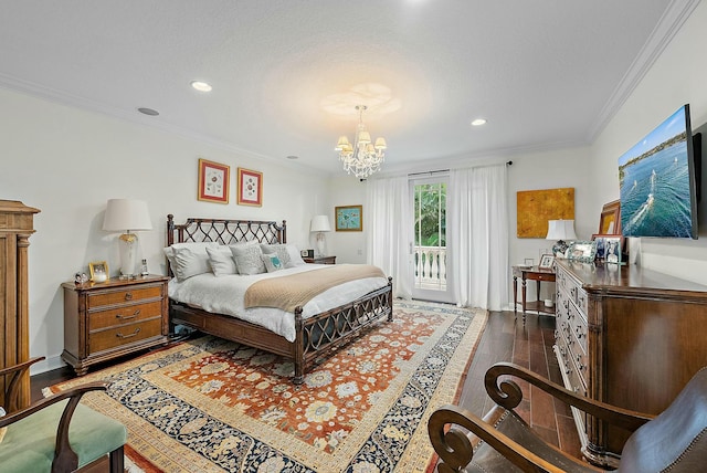 bedroom featuring access to exterior, dark wood-type flooring, ornamental molding, and a notable chandelier