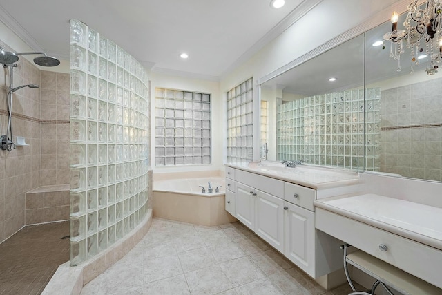 bathroom with tile patterned flooring, ornamental molding, separate shower and tub, and vanity