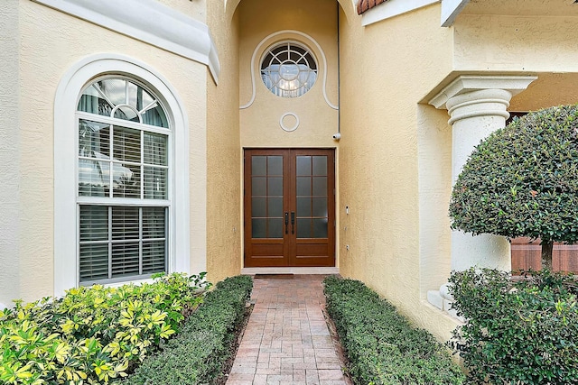 entrance to property featuring french doors