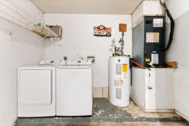 laundry room with washer and dryer, water heater, and heating unit