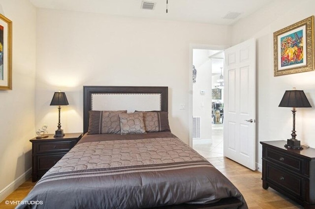 bedroom with light wood-type flooring