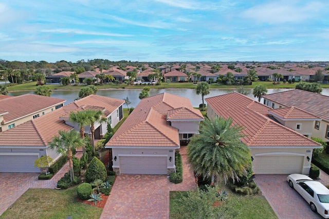 drone / aerial view featuring a water view