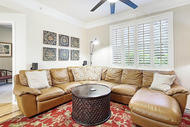 living room with crown molding, ceiling fan, and hardwood / wood-style floors