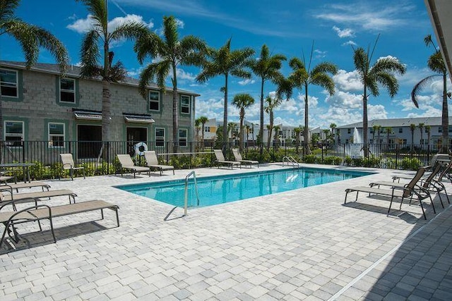 view of swimming pool featuring a patio