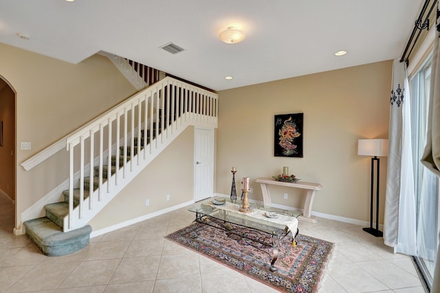 living room with light tile patterned floors