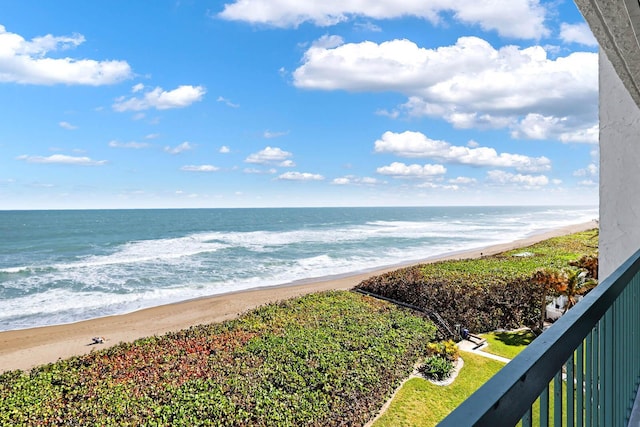 view of water feature with a beach view