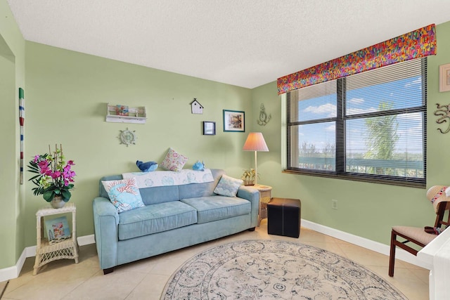 living room with light tile patterned floors and a textured ceiling