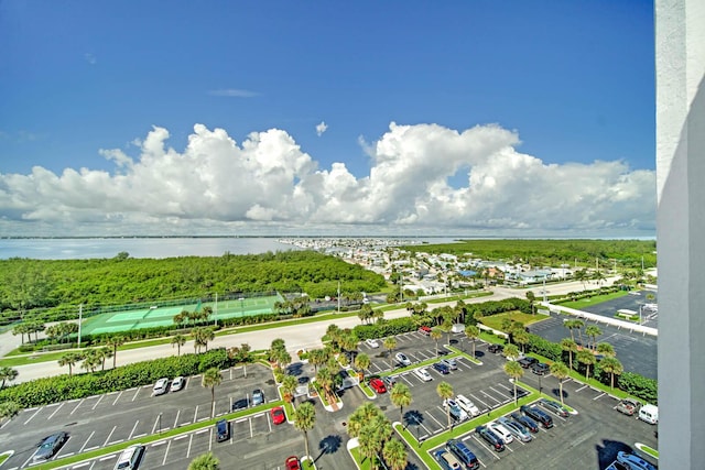 birds eye view of property featuring a water view