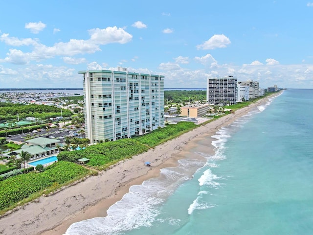 aerial view with a view of the beach and a water view