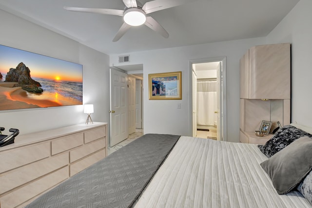 bedroom with ceiling fan and ensuite bathroom