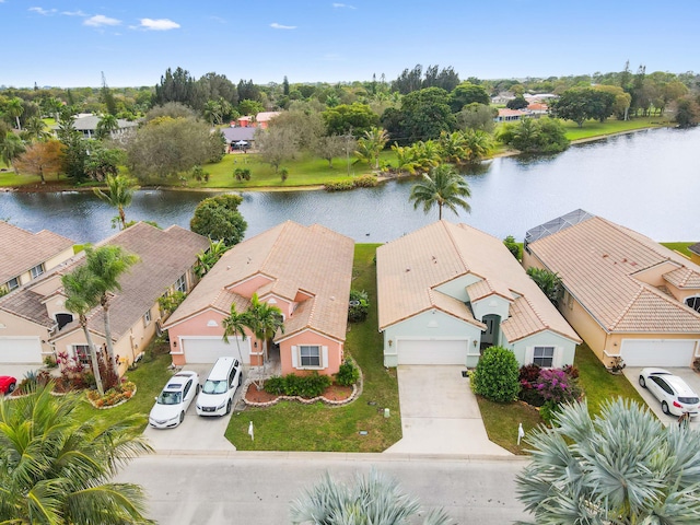 drone / aerial view with a water view