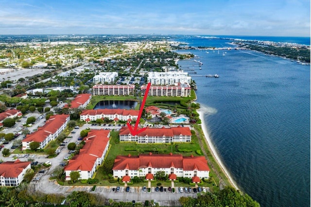 birds eye view of property featuring a water view