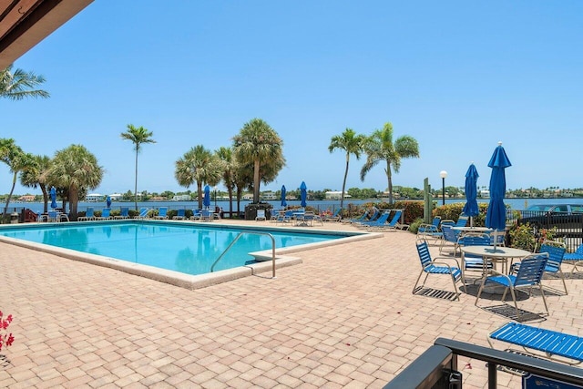 view of swimming pool featuring a patio area