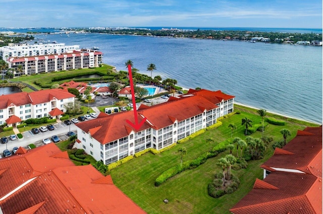 birds eye view of property featuring a water view