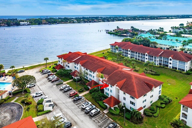 bird's eye view with a water view