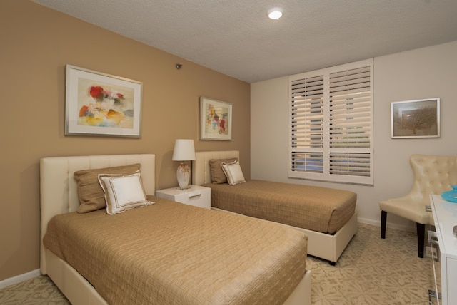 bedroom with a textured ceiling