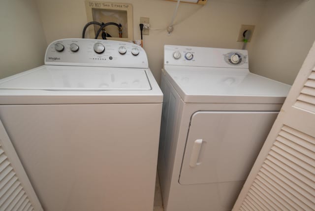 washroom featuring separate washer and dryer