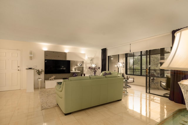 living room featuring light tile patterned flooring