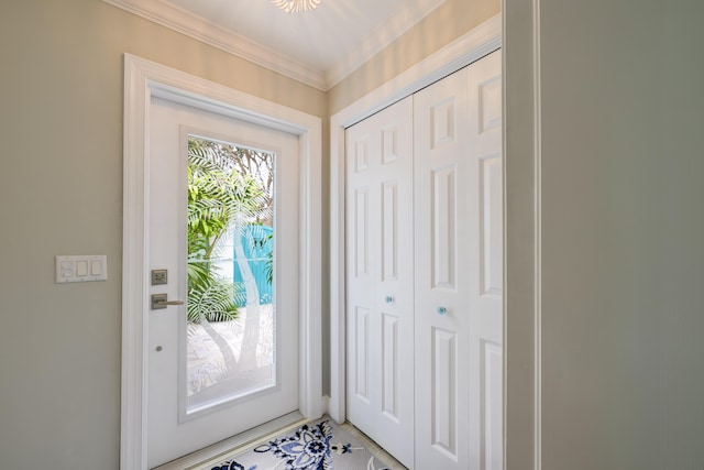 doorway featuring ornamental molding