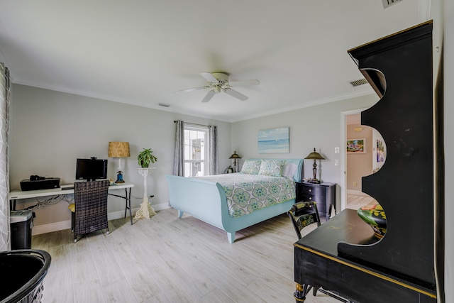 bedroom featuring ceiling fan, crown molding, and light wood-type flooring