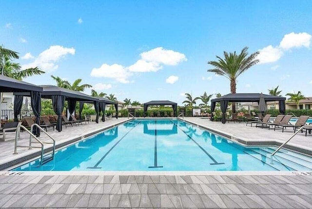 view of pool featuring a patio area and a gazebo