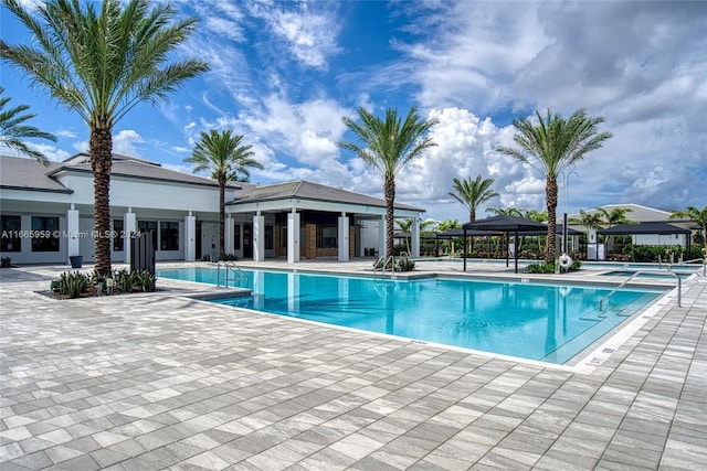 view of pool with a gazebo and a patio