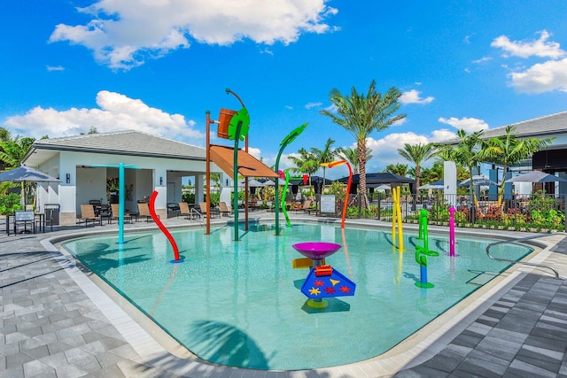 view of swimming pool featuring a patio area