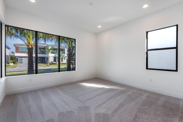 unfurnished room featuring carpet floors