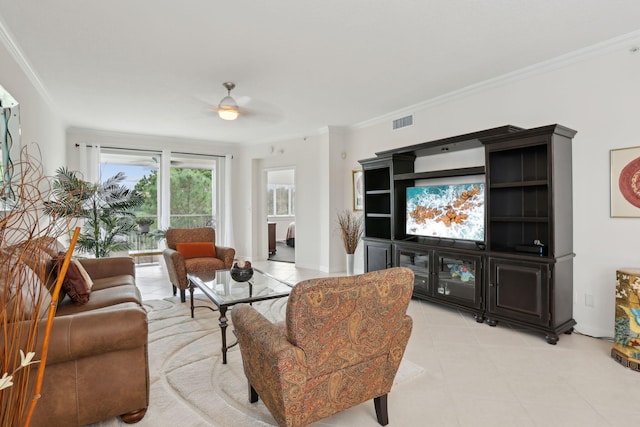 living room with crown molding, light tile patterned floors, and ceiling fan