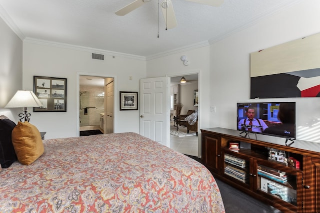 bedroom featuring crown molding and ensuite bathroom