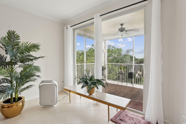 doorway to outside featuring crown molding, light tile patterned flooring, and ceiling fan