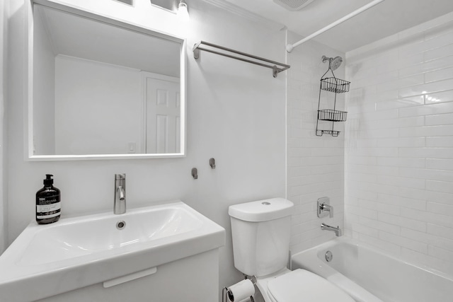 full bathroom featuring sink, toilet, and tiled shower / bath