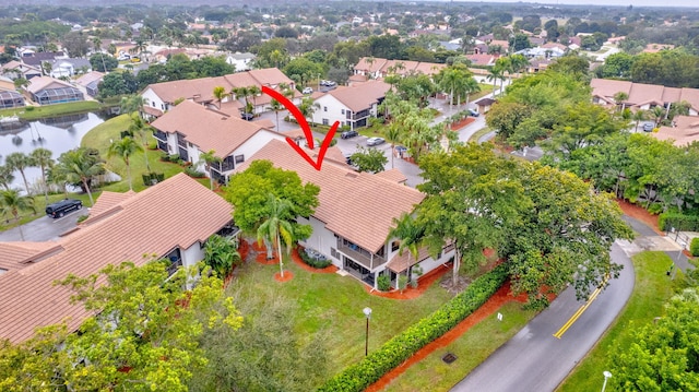 birds eye view of property featuring a water view