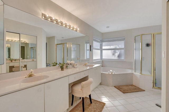 bathroom with vanity, tile patterned floors, and independent shower and bath