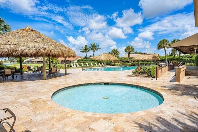 view of pool featuring a gazebo and a patio area