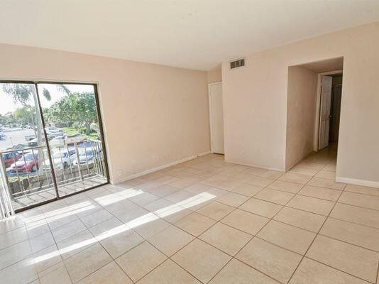 empty room featuring light tile patterned flooring