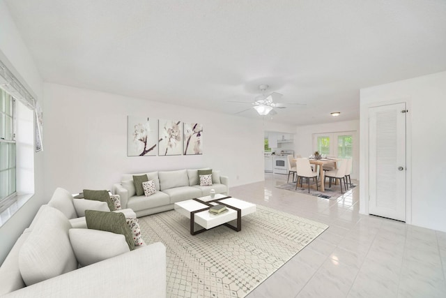 living room featuring ceiling fan