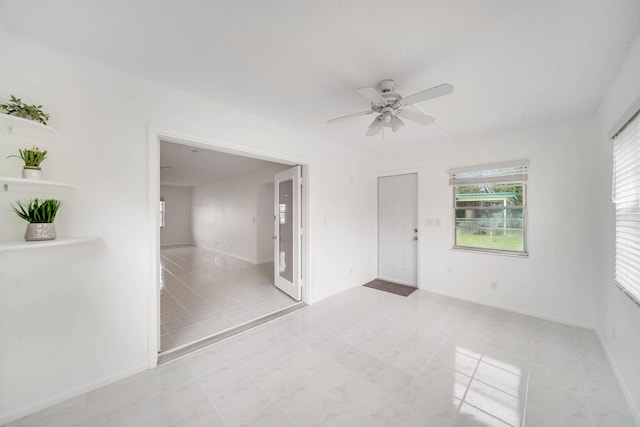 spare room featuring ceiling fan