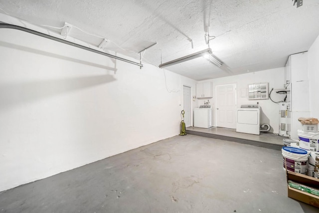 garage featuring washer and clothes dryer