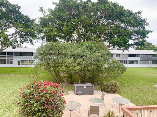 view of patio / terrace featuring an outbuilding