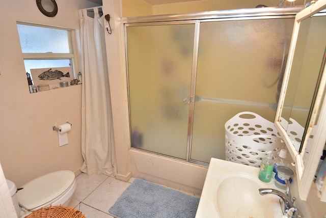 full bathroom featuring enclosed tub / shower combo, toilet, tile patterned flooring, and sink